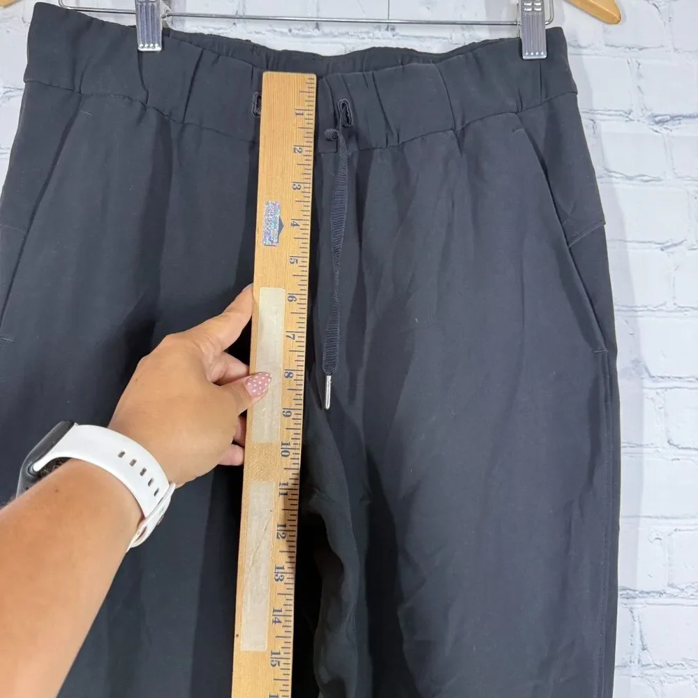 Lululemon On The Fly Pants Black Women's Size 6 Tapered Drawstring W5BPMS